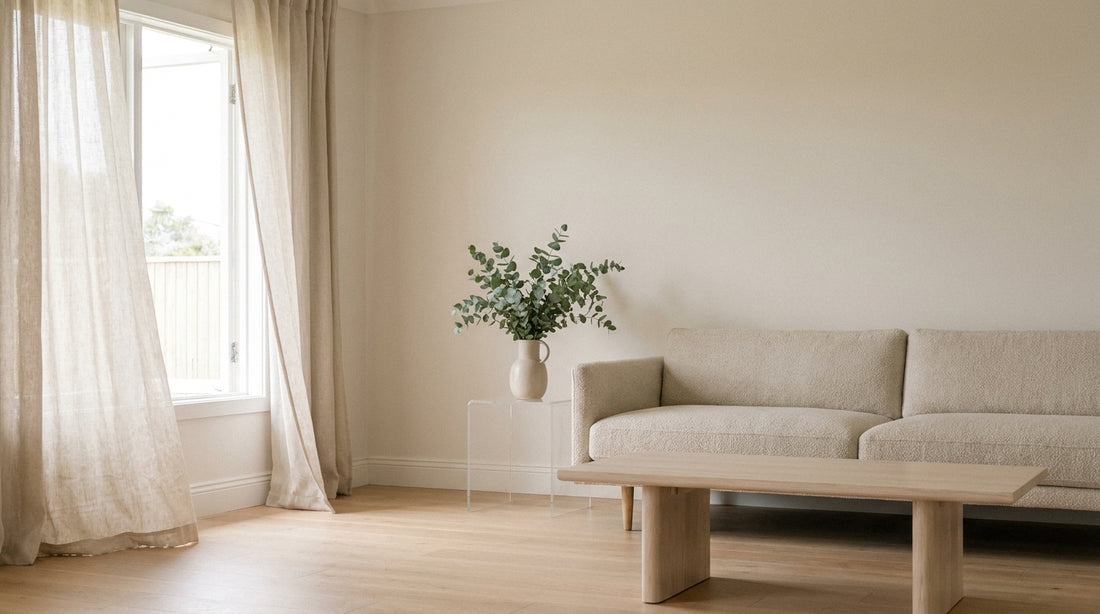 An airy, fresh Australian living room with an open window and light linen curtains