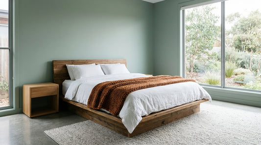 A cosy contemporary Australian bedroom with clean walls in cool winter daylight